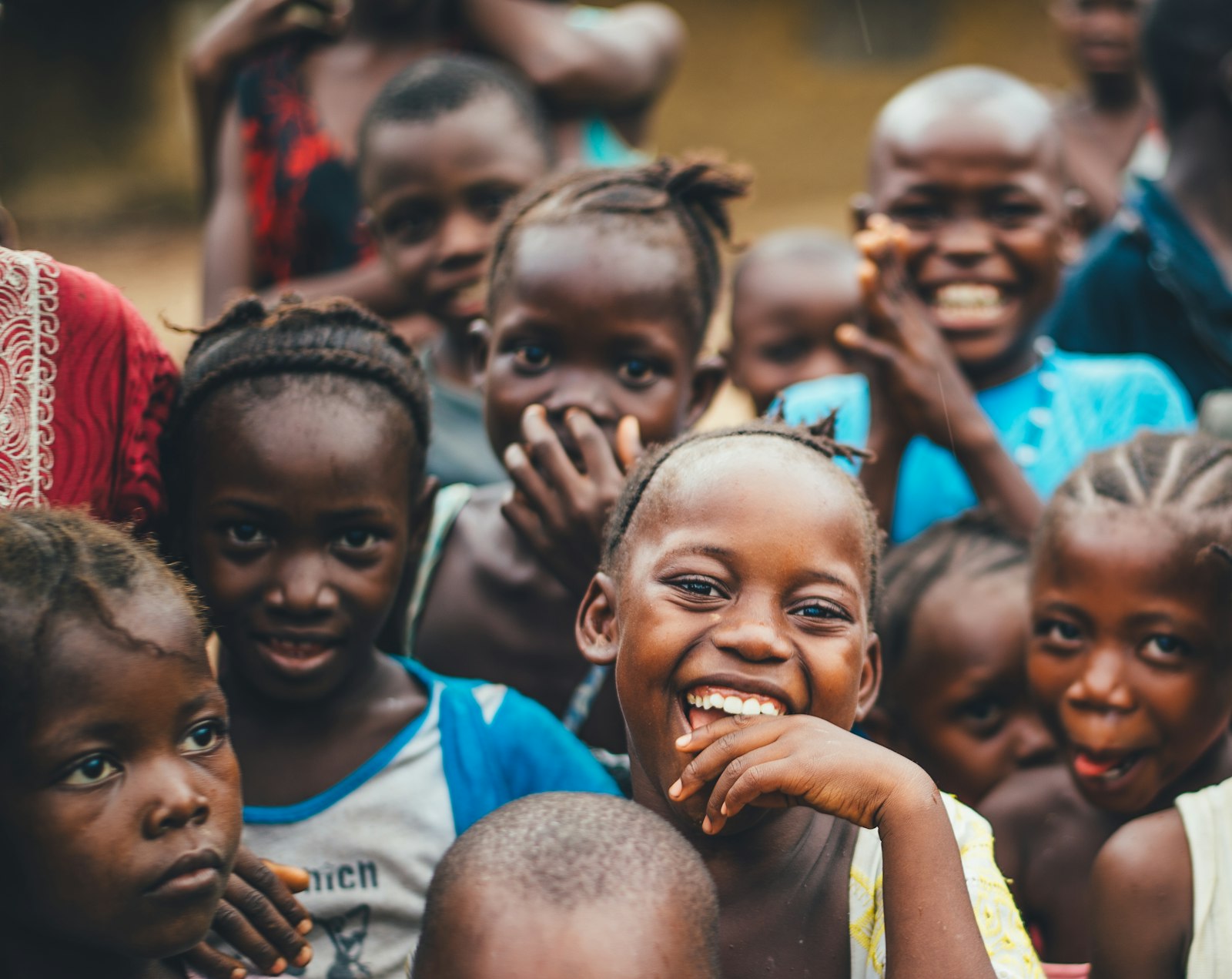 Children laughing with hope in a rural community